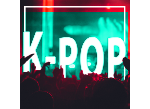 The word K-Pop in bright white text behind a crowd of people dancing with crimson and mint lights on them
